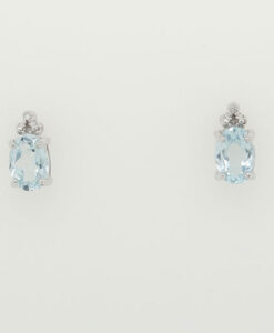 STERLING SILVER OVAL BLUE TOPAZ and DIAMOND EARRINGS