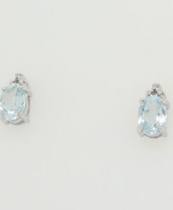 STERLING SILVER OVAL BLUE TOPAZ and DIAMOND EARRINGS