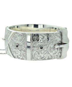 A vintage sterling silver buckle bangle. Crafted in solid sterling silver.