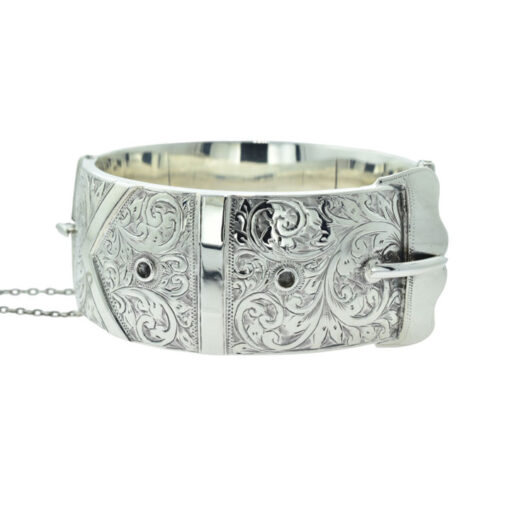 A vintage sterling silver buckle bangle. Crafted in solid sterling silver.