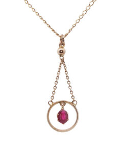 front view of rose gold ruby necklace