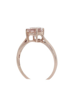 Side view of 10ct rose gold morganite solitaire ring with four-claw setting.