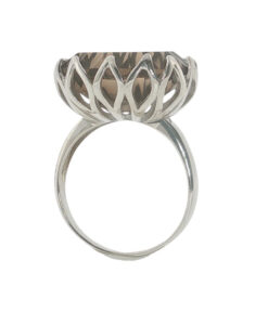 Sterling silver smoky quartz statement ring with large faceted oval gemstone and decorative openwork claw setting.