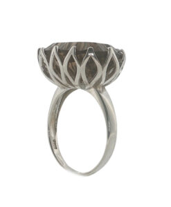 Sterling silver smoky quartz statement ring with large faceted oval gemstone and decorative openwork claw setting.